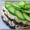 Chicken salad with prunes and cucumber
