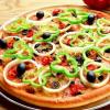 Pizza with tomatoes, sausage and cheese - a universal dish for all occasions